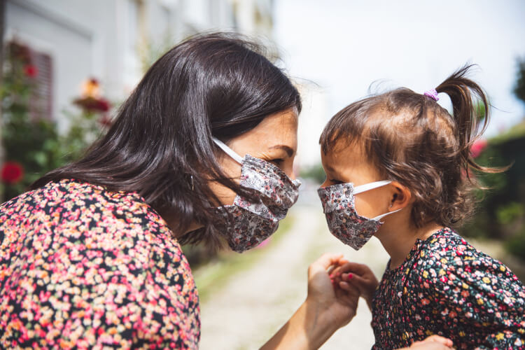 Parents and children wear masks