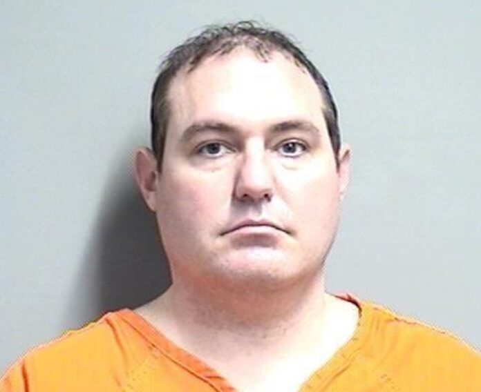 Man allegedly plants gun, drugs in wife’s car in custody