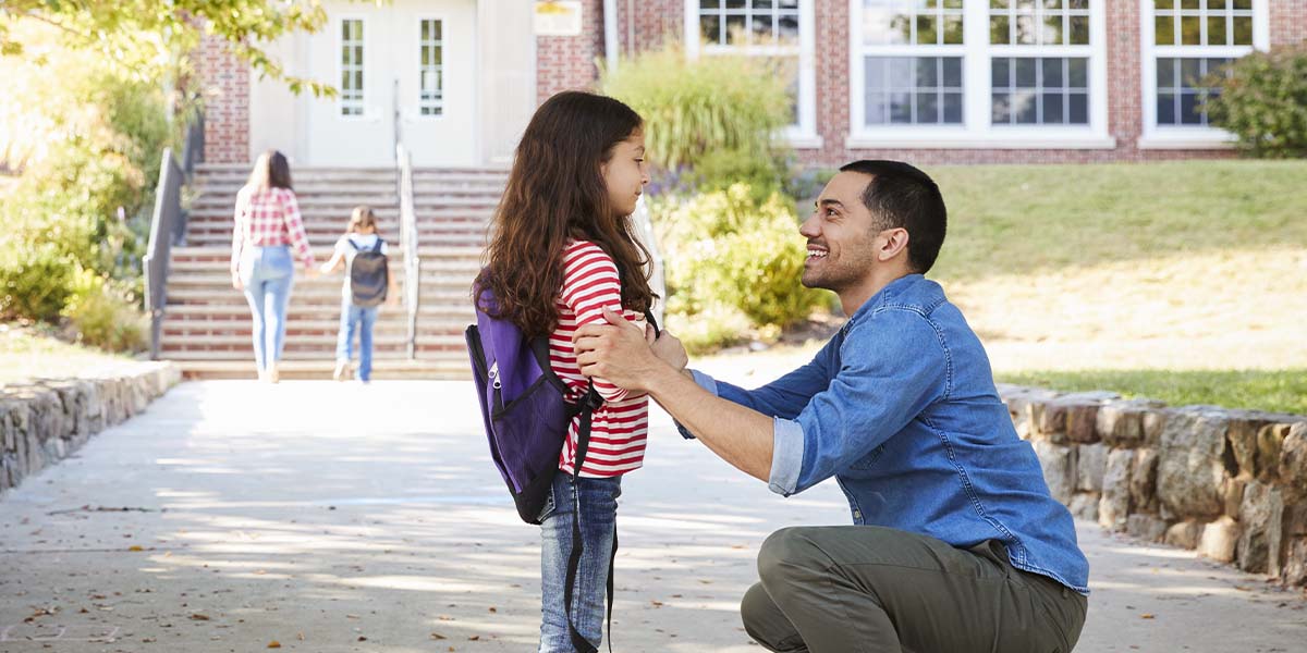 Right of first refusal: Divorced father picks up his daughter after school